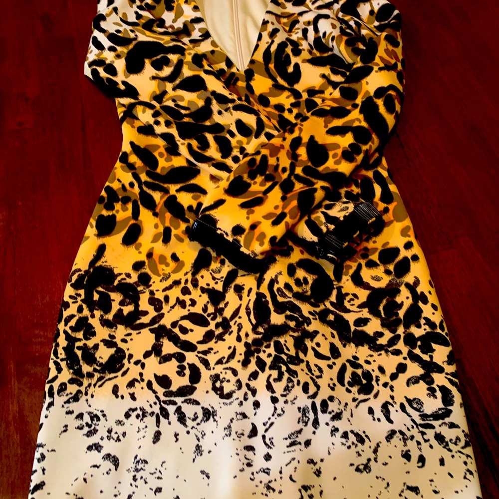 Absolutely gorgeous Bebe leopard sexy dress size M . Must have for party!